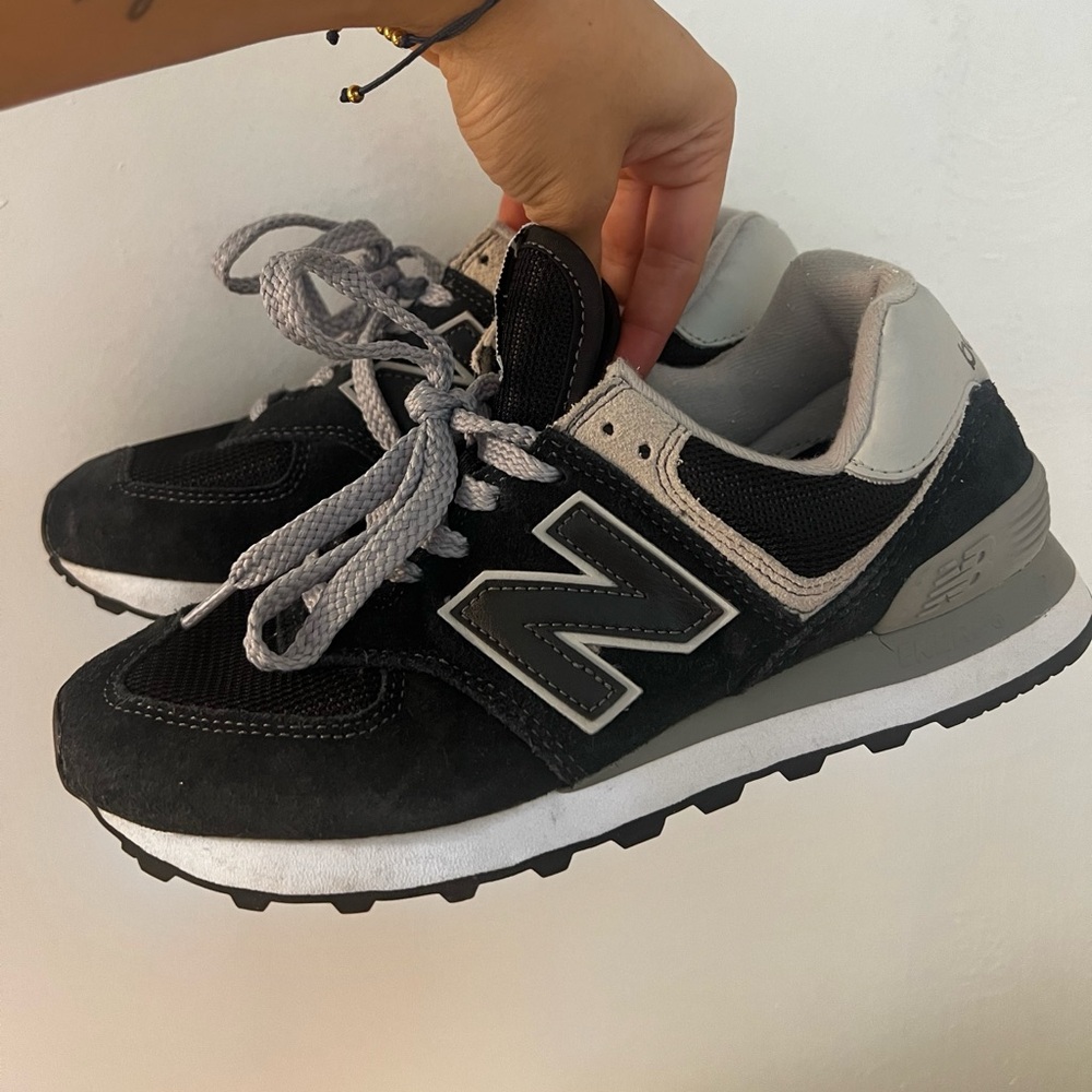 Gently used Navy Blue New Balance 574 Sneakers